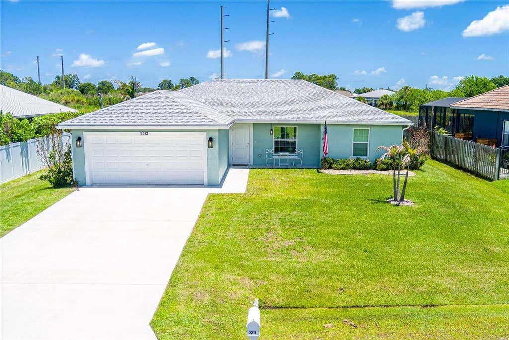 Photo of 2213 SW Salmon Road, Port Saint Lucie, FL 34953 (MLS # B26031717)