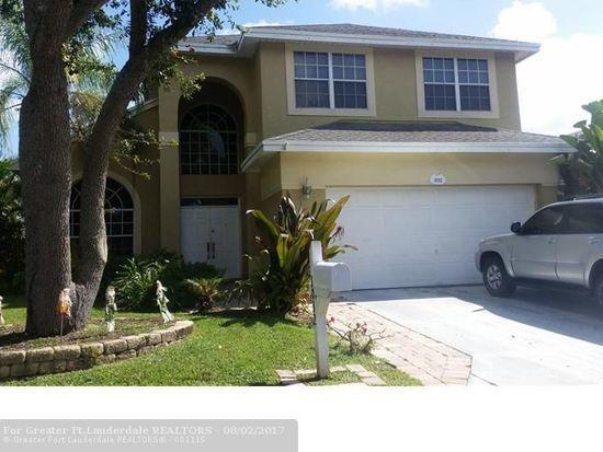 Very Spacious and well maintained home with 20ft High Celling in the Living Room & Dining Room. Open kitchen with Breakfast area, to large Family Room. Beautiful 16'' natural tile throughout the downstairs area and wood flooring in the bedrooms. Huge screened porch that overlooks private fence backyard. New A/C units. Well maintained yard. Community offer gated pool, playground and more.
