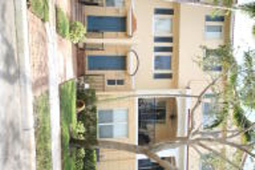 Parkside Square of Boynton Beach offers this exceptional 3 Level Townhome.  Enjoy the square footage of a single family home in a townhome that requires little to no exterior maintenance.  This townhome offers 3 true bedrooms in addition to a bonus room on the first level. The 2 1/2 car garage is overly spacious accommodating 2 cars comfortably in addition to a significant amount of storage space.  On the second level you will fins the kitchen, living room, dining area, powder bath and covered balcony.  The third level includes your master suite with a custom walk-in closet, wall to wall closet and large bathroom with soaking tub, separate shower and his/her vanities.  2 additional bedrooms and a full bathroom are on the third level as well. The living areas are tiled.  The kitchen counters are tiled as well as the backsplash.  The kitchen offers a large island as well as a breakfast counter.  The covered balcony is the perfect place to relax with your morning coffee.  Complete HVAC system replaced 10/2012.  Parkside Square is centrally located within walking distance to shops, restaurants, shopping mall, several gyms, highways and schools.  The Parkside Square HOA is very healthy.  The monthly dues have never increased since the community was established.  Community amenities include pool, gym, basketball, picnic/bbq area and play ground. Parkside is a pet friendly community.