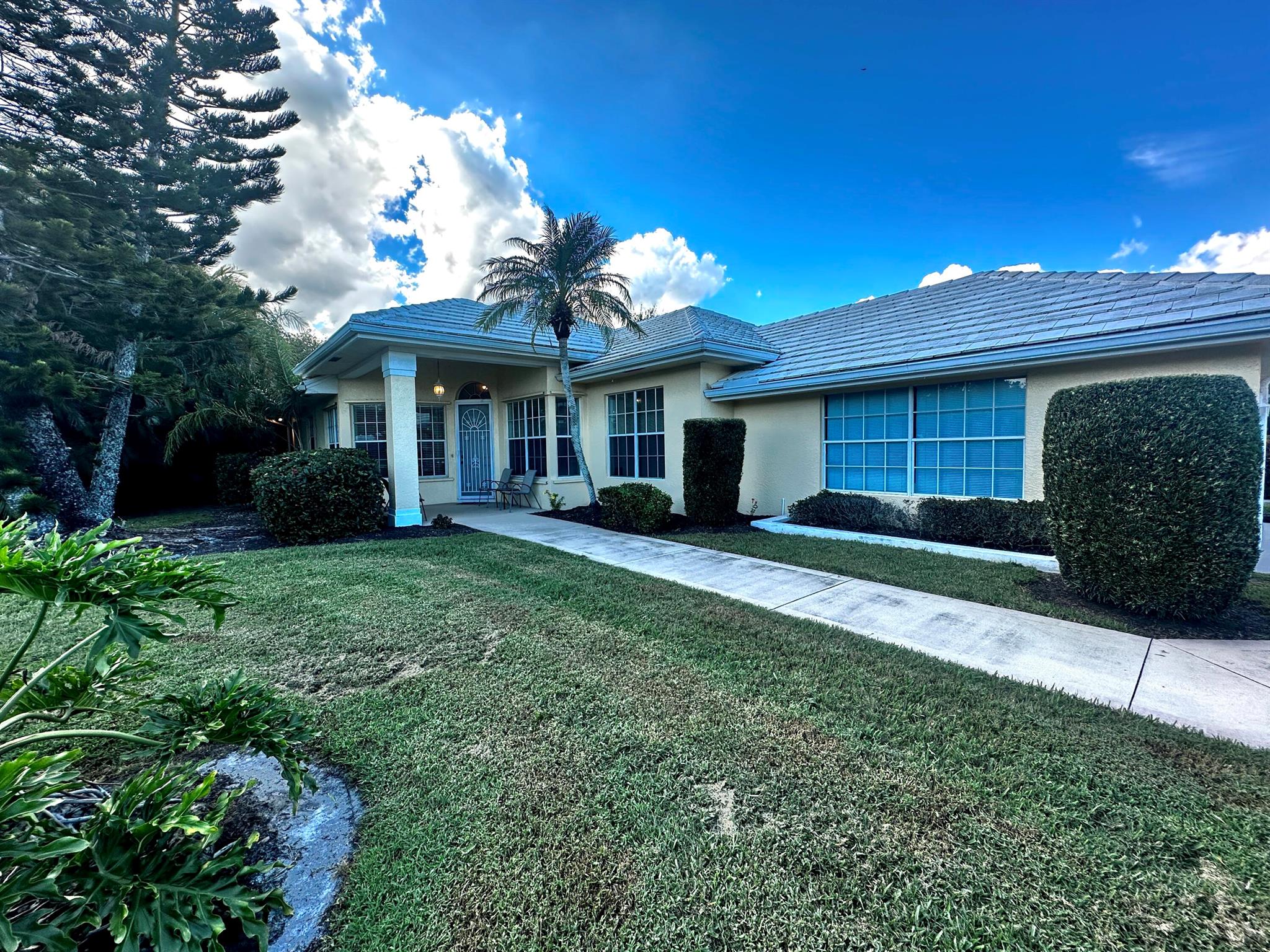 Single Family 3 bed 2 bath , 2 car garage and screened pool located in Fairway Isles, St Lucie West.   Lovely subdivision.  Home has a lovely pond view.  Split bedrooms.  Wood floor in Primary Suite and 1 guest room.  TIle though out the rest of the house.  Eat in Kitchen, granite counters and separate dining area. Inside laundry Room.  HOA covers basic Cable, lawn care, exterior painting every 8 yrs. Fairway Isles is part of St Lucie Country Club Estates Association with Community pool and clubhouse.