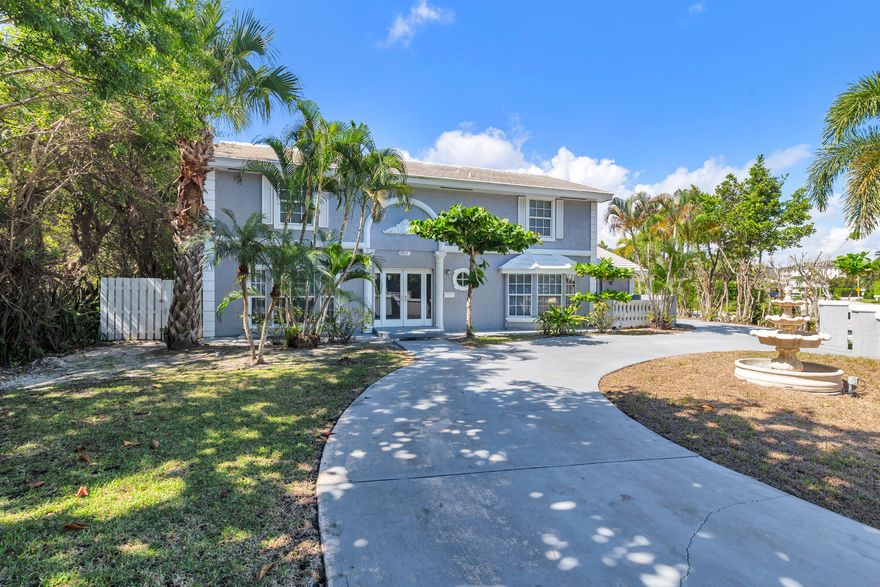 Spacious residence on the Northern corridor of Flagler Drive! This wonderful 4BR/4BR + 1/1 guest wing. Recently refreshed, the home features a brand new kitchen with quartz countertops, waterfall island, and new appliances. The main floor of the home has multiple living areas with open access to the rear enclosed porch overlooking the yard. The main floor also has an attached 1/1 guest quarters with its very own parking and entrance. Upstairs the primary suite opens up to a balcony and a large ensuite bath with soaking tub, shower, and dual vanities. The outdoor space features a large pool, outdoor kitchen, and is completely fenced in. Close proximity to Palm Beach Island, The Nora District, CityPlace, and Palm Beach International Airport.