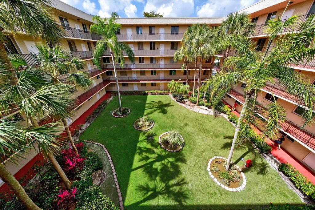 Photo of 3223 Riverside Drive #C-406, Coral Springs, FL 33065 (MLS # B26019076)