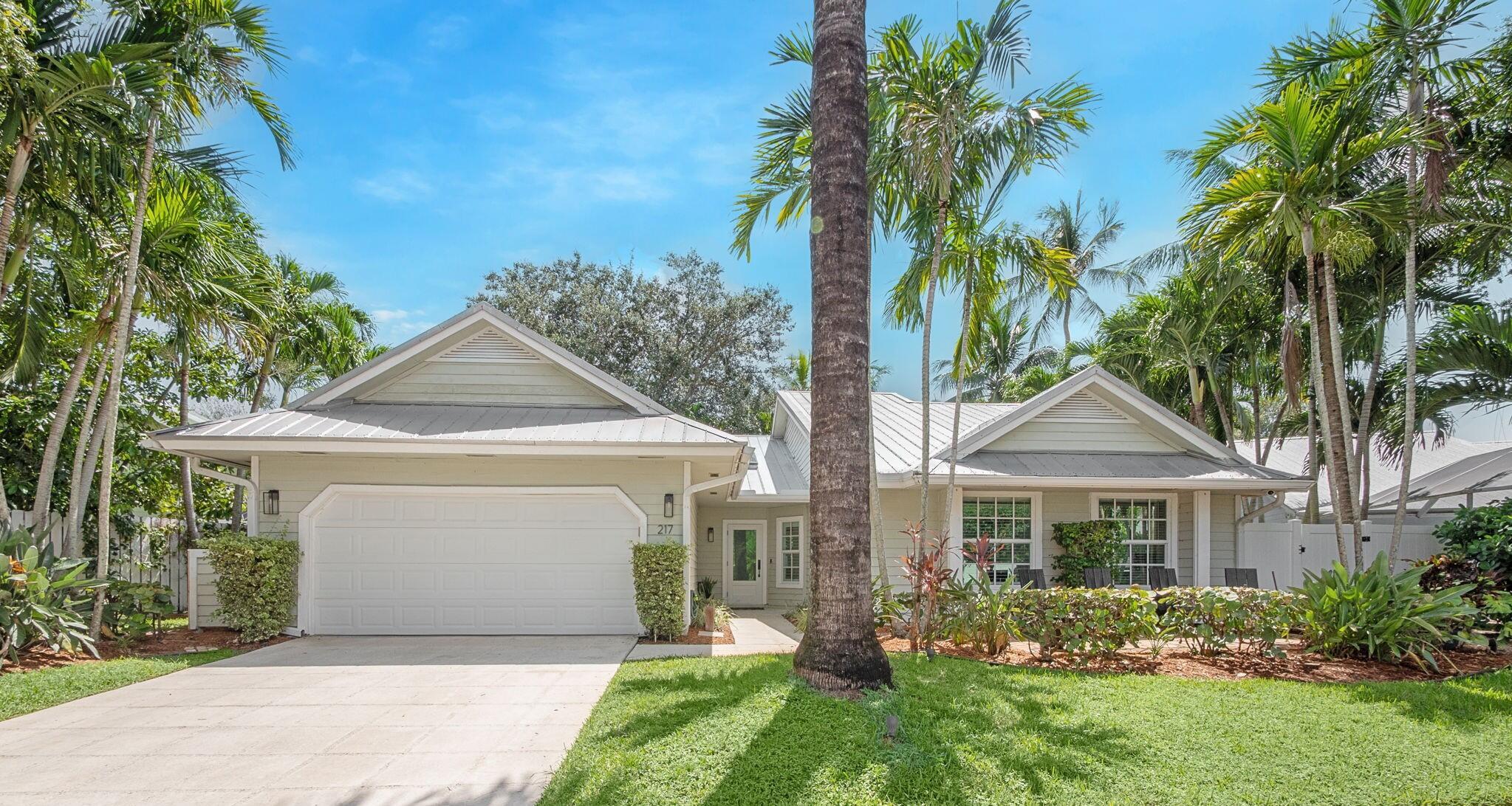 This gorgeous home is completely remodeled with designer finishes throughout! Located on a quiet cul-de-sac in The Colony at Maplewood a charming community of only 33 homes this beautifully updated property is just two doors down from the community pool. Enjoy relaxing on the front patio, perfect for chatting with neighbors or watching the kids play. Features include a metal roof, impact glass windows & pocketing sliding doors, soaring cathedral ceilings, and an open split-bedroom floor plan. The spacious kitchen offers quartz countertops, stainless steel appliances, abundant cabinet storage with pull-out drawers, and plantation shutters. Large covered lanai and side yard make this home ideal for indoor-outdoor living. Yard & Pest Control Included