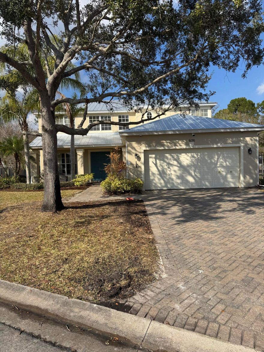 NEW METAL ROOF! Welcome to your dream home in the heart of Vero Beach, FL! Situated on a beautiful, quiet cul de sac, this home boasts 5BED|3BATH. This stunning 2-story residence boasts 2,722 sq ft of beautifully designed living space, offering the perfect blend of elegance & comfort. Fully fenced & features a screen patio! Gourmet kitchen with its light blue 42-inch cabinets, complemented by lush landscaping & a spacious two-car garage. Step inside to be greeted by a bright & airy open floor plan. The living area is impeccably designed for entertaining, featuring tile throughout the first floor & sleek wood tile flooring in the second floor, master bedroom features a spacious walking closet, offering picturesque views of the serene backyard. Huge Lot-Mon-Fri is best to schedule to a tour.