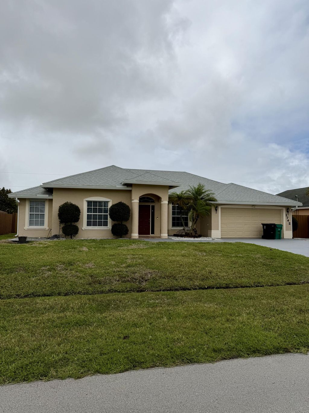 Photo of 1742 SW Effland Avenue, Port Saint Lucie, FL 34953 (MLS # B26014728)
