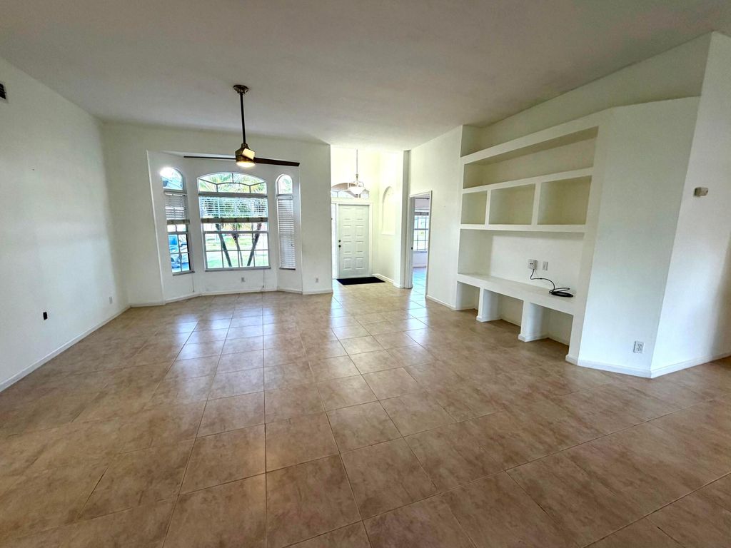Photo of 1742 SW Effland Avenue, Port Saint Lucie, FL 34953 (MLS # B26014728)