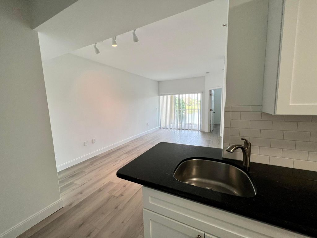 Photo of 2040 Greenview Shores Boulevard #214, Wellington, FL 33414 (MLS # B26006482)