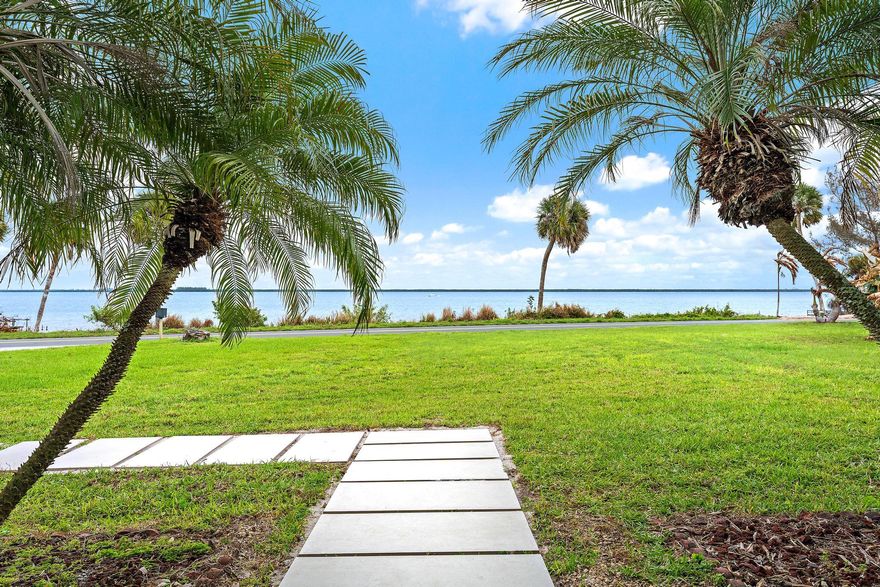 Set along the Designated Florida Scenic Route, this exceptional 2.65-acre Intracoastal property offers 153 feet of wide waterfront along one of the most desirable stretches of Indian River Drive. Freshly painted inside and out, the 2,128-square-foot residence includes 2 bedrooms, a potential 3rd bedroom, and 3 baths, with recent improvements such as new stainless steel appliances, new LVP flooring throughout the living areas, new large-format front steps and front tile, and a metal roof. Elevated approximately 25 to 30 feet above the Intracoastal and backed by a state preserve, the property is a rare blend of privacy, natural beauty, and classic Old Florida charm framed by banyan trees and palms.