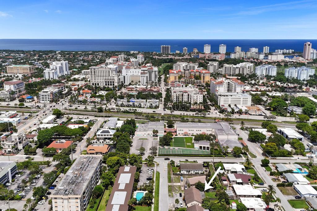 Be a part of the 'Boca Raton Boom''. This type of rare investment opportunity only comes so often, and now is your chance. This duplex consists of two 2/2's each with its own washer/dryer & each unit has its own private screened in patio & private backyard. Plenty of parking. AC's (2016) & (2021). Roof (1999). Newer quality cabinetry in spacious kitchens. Tile throughout in both units. PVC pipes. Hurricane shutters. Location, location, location! Walk to City Hall, downtown Boca, beaches, parks and the newly proposed project of a 30-acre plan near Palmetto Park Road and the Brightline station to redevelop city-owned land into a new city hall, community center, dining, retail and office space. Get in now while you still can!