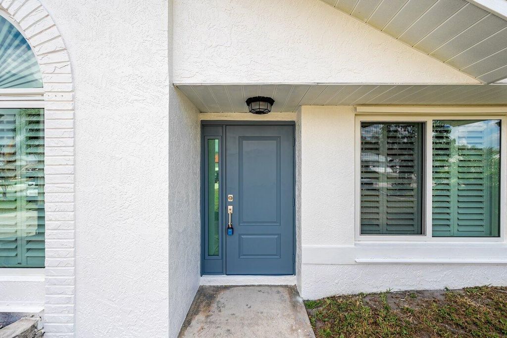 Photo of 2812 SE Pace Drive, Port Saint Lucie, FL 34984 (MLS # R11154456)
