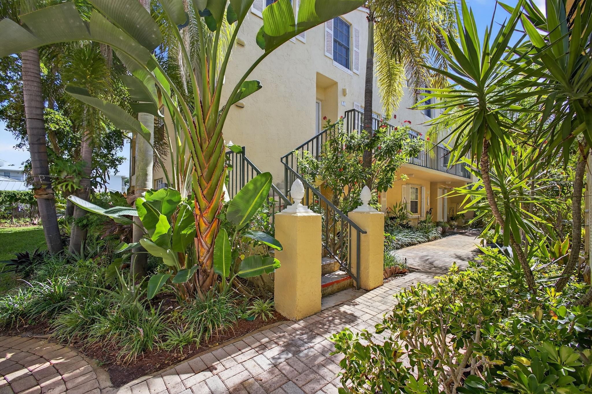 Welcome to resort style living in this 2 bedroom/2 bathroom 2-story top-level, corner unit with a garage. A bedroom and bathroom downstairs and a private primary suite upstairs with new flooring. Conveniently equipped with washer and dryer for your convenience and stainless steel appliances. Access the community pool with waterfront views, clubhouse, grills, fitness center and private sand area. Secure gated community near walking/jogging trails, fishing and Kelsey Park with a playground and pickleball courts. Conveniently located close to beautiful beaches, boating/water activities, fine dining and abundant shopping. Travel options within 12 miles: international airport, Interstate/Turnpike, and train stations. Association approval with credit/background check required.