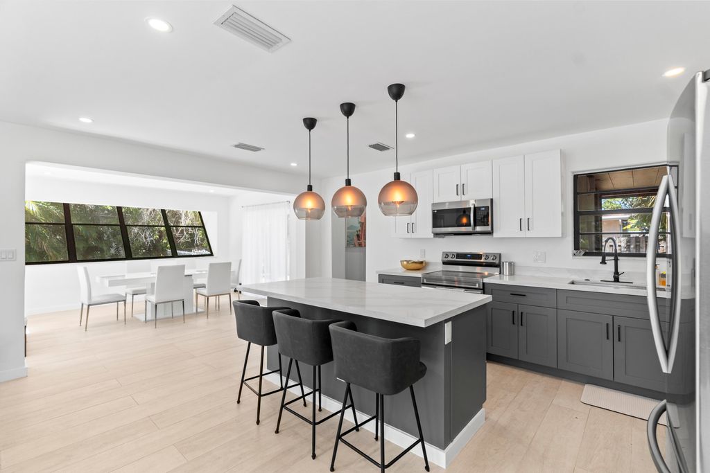 Photo of 235 NE 20th Street, Boca Raton, FL 33431 (MLS # B26017275)