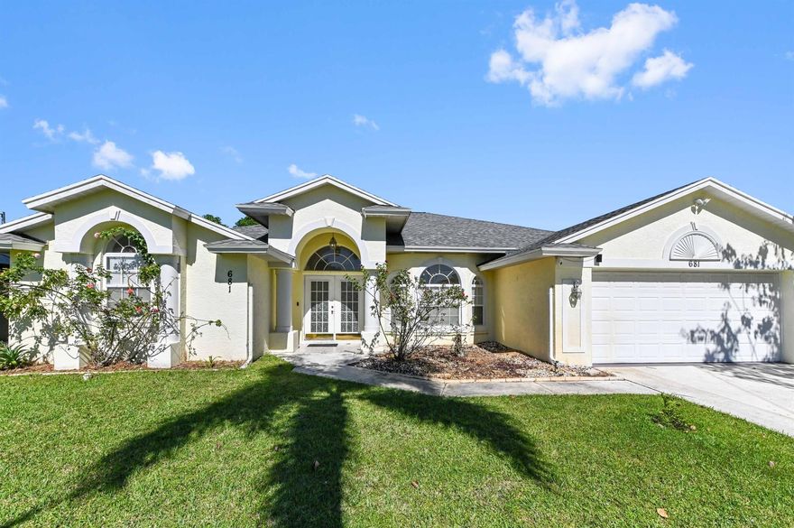 Welcome home! This inviting Port St. Lucie retreat sits in a quiet, non-HOA neighborhood near parks, boat-friendly waterways, shopping, and commuter routes. Enjoy easy single-level living with bright, open gathering spaces for everyday life and effortless hosting. The comfortable bedroom layout gives the main retreat privacy, with extra rooms for guests, a home office, or hobbies. The kitchen offers ample workspace and connects to the dining and living areas. Step outside to a sunny backyard with mature fruit trees--pick seasonal treats, grill with friends, or add garden beds and a play set. Practical perks include an attached garage, generous driveway, and a prime location minutes to Oak Hammock Park, Jessica Clinton Park, Tradition/Gatlin, I-95, and the Turnpike.