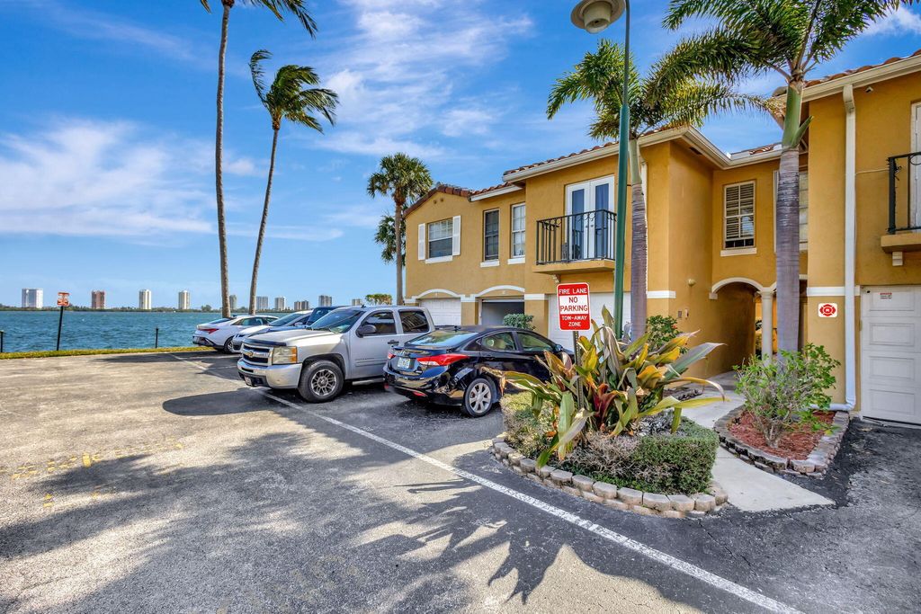 Photo of 1060 Lake Shore Drive #Apt 204, Lake Park, FL 33403 (MLS # B26011809)