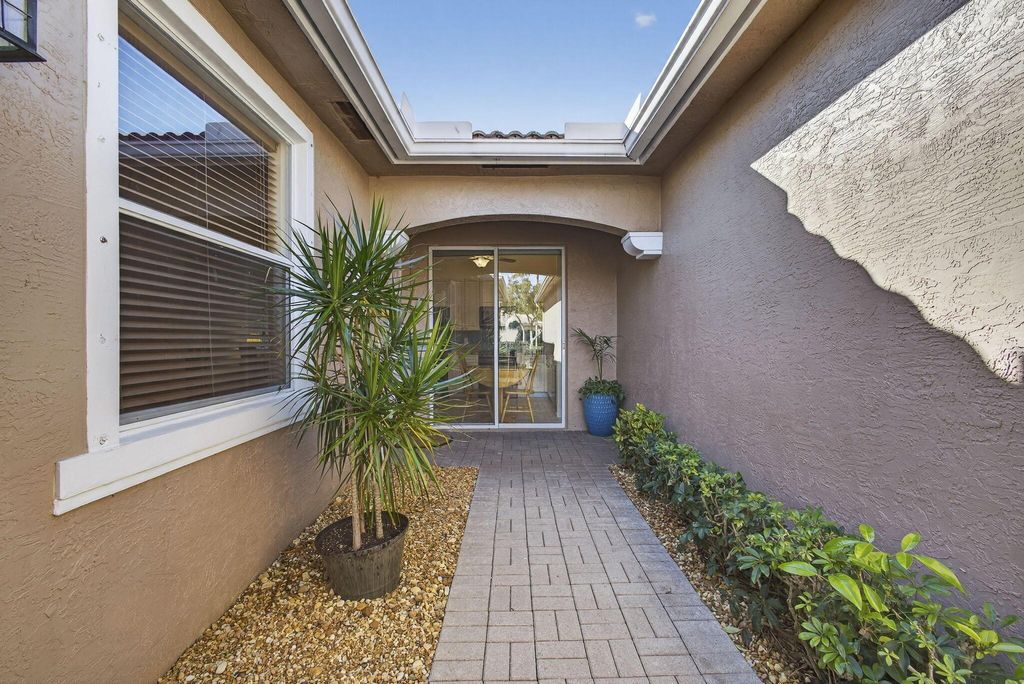 Photo of 8638 Lineyard Cay, West Palm Beach, FL 33411 (MLS # R11149481)