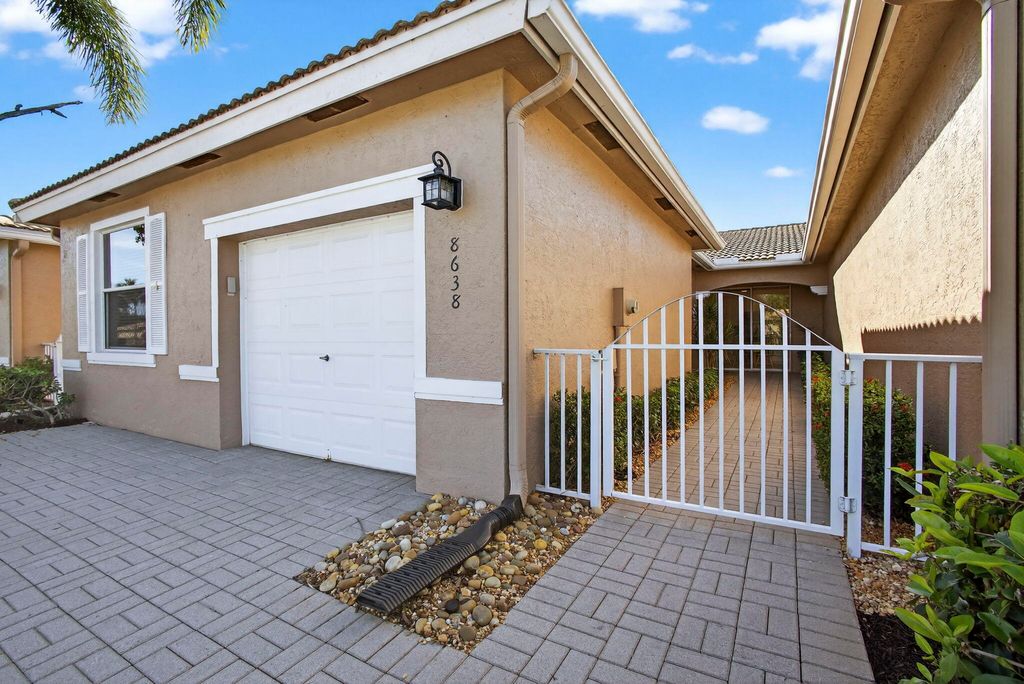 Photo of 8638 Lineyard Cay, West Palm Beach, FL 33411 (MLS # R11149481)