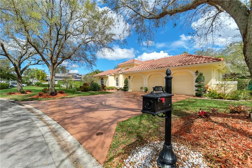 VERY RARELY AVAILABLE! Beautifully updated home in a unique neighborhood of 42 custom homes. Everything has been updated! Thirteen foot ceilings with crown molding in main living area and primary bedroom. Light bright home with tons of natural light. Elegant plantation shutters. Impact windows, and accordion shutters. New wide plank oak floors. Chef's kitchen has a  WOLF Gas stove with grill, Subzero refrigerator and an island with space for eight at Sunday Brunch. Primary bath with free standing soaking tub. His and hers custom closets. Water heater 2019. A/C units installed 2019 and 2021. Pool resurfaced 2022. Split floor plan.  Property has a fenced backyard and is a half acre lot. "A" rated Parkland schools.  WELCOME HOME!
