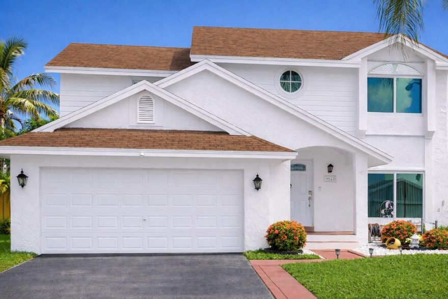 MOVE-IN READY South Florida gem! This STUNNING 4-bedroom, 2.5-bath single-family home with a 2-car garage has been meticulously maintained and is ready for immediate enjoyment. Highlights include A BRAND NEW ROOF (2025), hurricane impact windows (2021), an UPDATED kitchen with PANTRY & wine rack NEW AC (2024) and new water heater (2024). All bathrooms have been tastefully updated. Ceramic tile flows through the first floor and stairs, with modern laminate flooring upstairs. One bedroom is converted into a dream dressing room w/CUSTOM CALIFORNIA CLOSETS. Enjoy an AMAZING TROPICAL BACKYARD with FRUIT TREES, GAZEBO, SHED, and a NEW 9-PERSON SPA perfect for entertaining or relaxing. Seller is offering a $3,500 BUYER CREDIT FOR exterior PAINTING. LOW HOA FEE—ONLY $520 ANNUALLY! A must-see home!