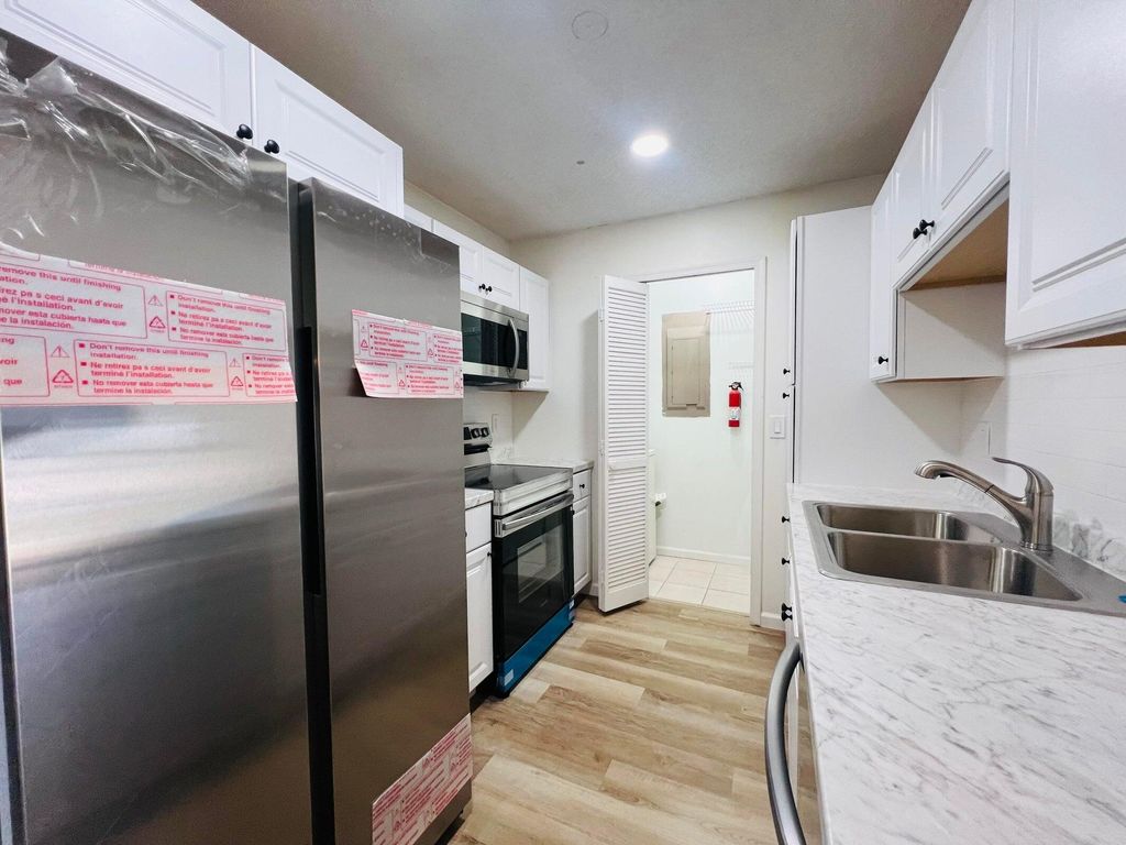 Photo of 11877 Sturbridge Lane, Wellington, FL 33414 (MLS # R11139139)