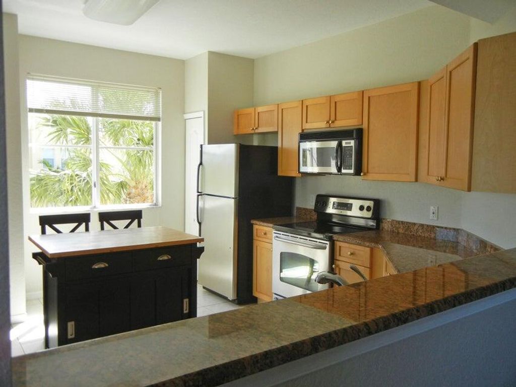 Photo of 11011 Legacy Lane #305, Palm Beach Gardens, FL 33410 (MLS # R10964178)