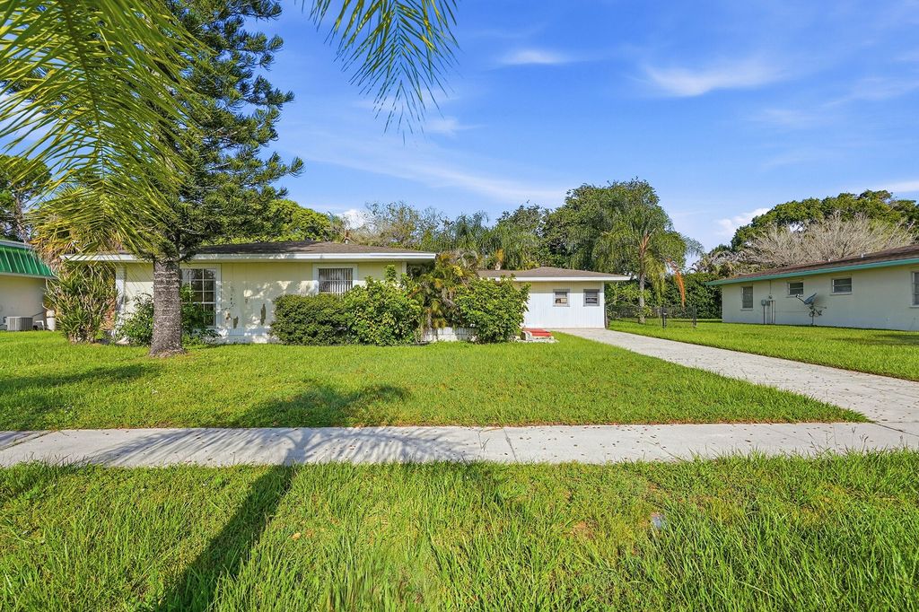 Photo of 854 SE Tierra Court, Port Saint Lucie, FL 34983 (MLS # B26057589)