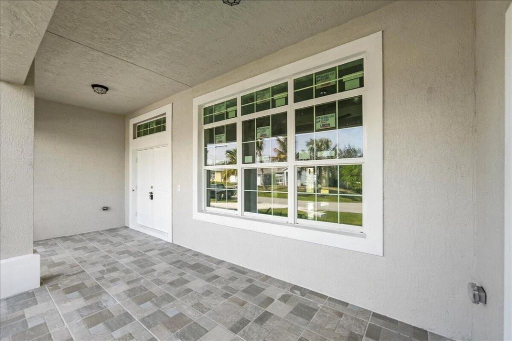Photo of 158 SW Sea Lion Road, Port Saint Lucie, FL 34953 (MLS # R11063469)