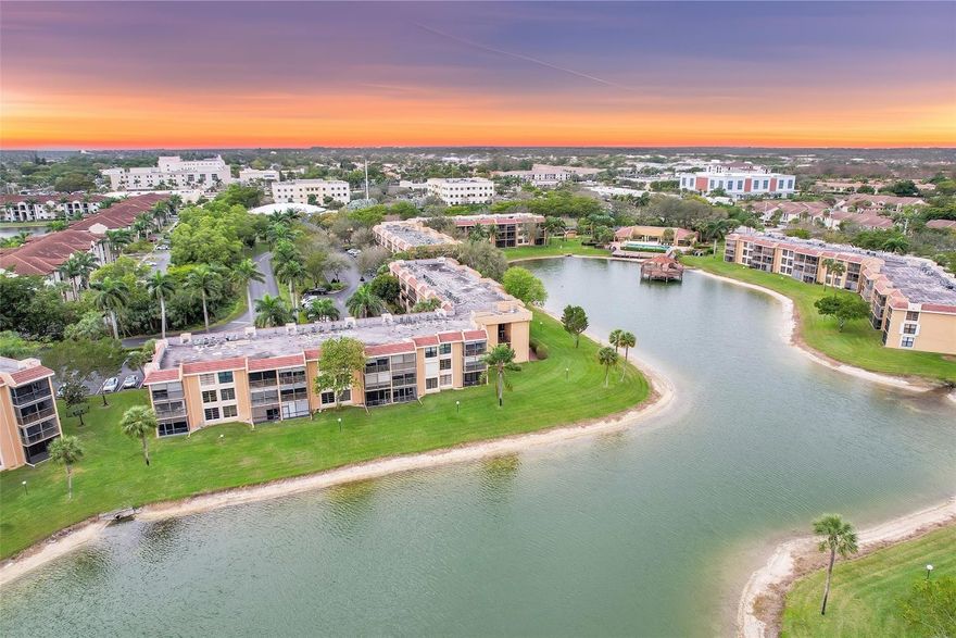 Lowest priced maintenance around in the best kept complex! Enjoy breathtaking WATERFRONT views from the comfort your balcony. 40 years passed; Budget is great! This 55+ 2/2 condo features: a spacious eat in kitchen w/ solid wood cabinets, walk in closet, newer A/C, WASHER/DRYER in the unit, and additional storage unit. Centrally located near Seminole Casino, hospital, and restaurants and close to the Trnpk & Sawgrass Exp. The building features an elevator while some of the community amenities include billiards, 3 heated pools, shuffleboard, walk/jogging path, tennis, pickleball & basketball courts w/ a clubhouse filled w/ activities you'll never be bored. The low maintenance fee includes cable TV, water, trash, exterior insurance, & common ground maintenance! $5K credit towards appliances