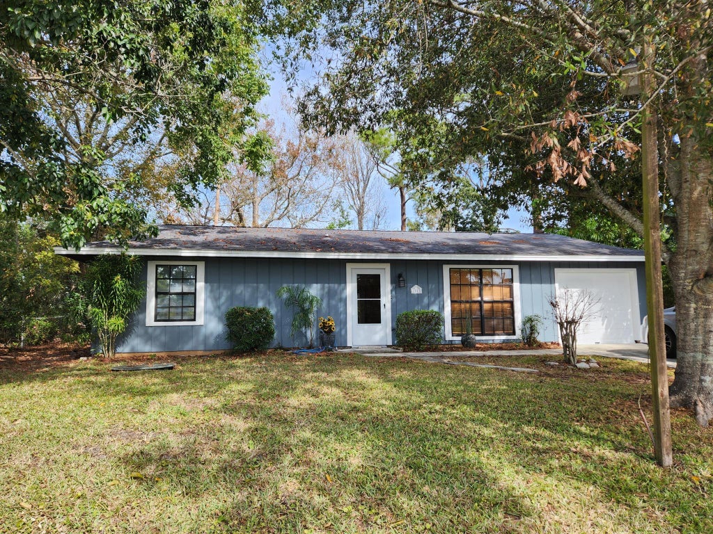 Photo of 1813 SW Altman Avenue, Port Saint Lucie, FL 34953 (MLS # R11058015)