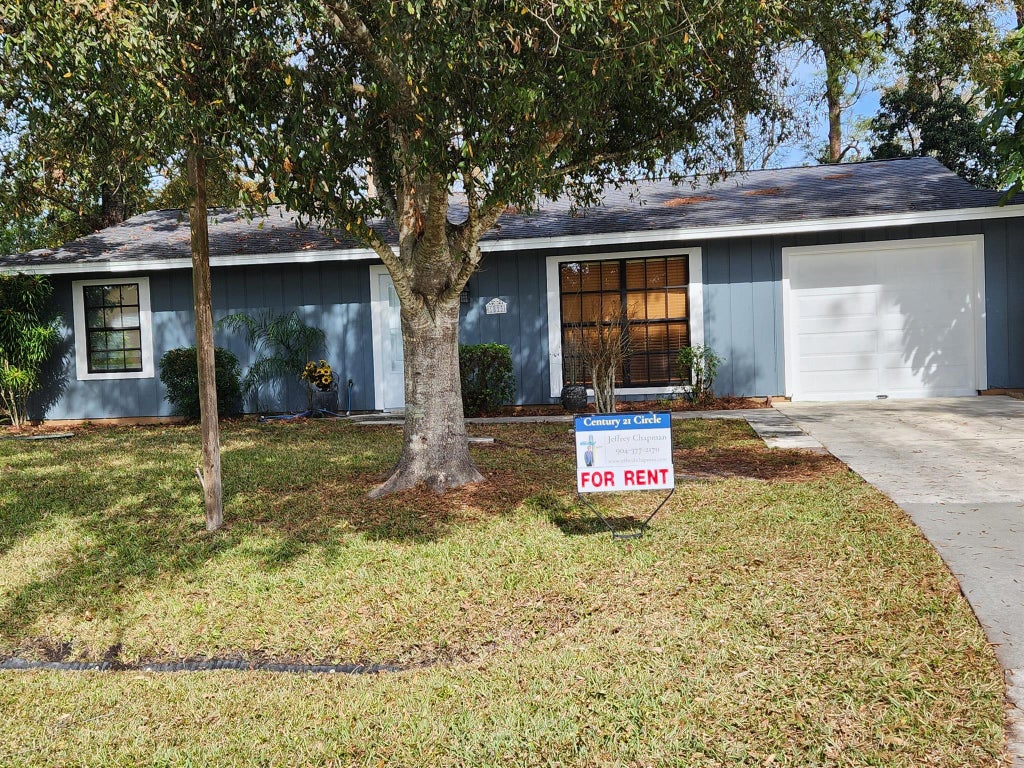 Photo of 1813 SW Altman Avenue, Port Saint Lucie, FL 34953 (MLS # R11058015)