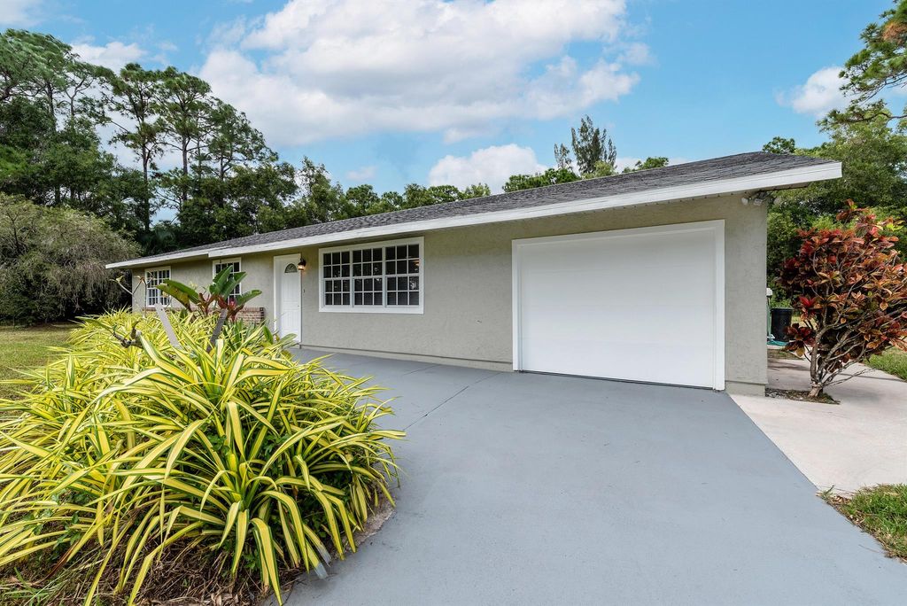 Photo of 13198 Randolph Siding Road, Jupiter, FL 33478 (MLS # R10934866)
