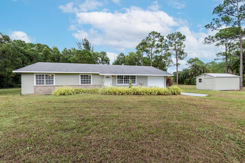 Photo of 13198 Randolph Siding Road, Jupiter, FL 33478 (MLS # R10934866)