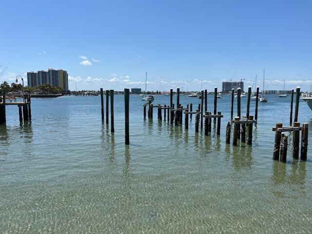 Single family residential lot or RM-15 (up to 7 units), 5 units without council approval, over 5 units needs site plan approval (6-8 months minimum or up to 1 year). 35' maximum height, 7' side setbacks.New submerged land lease with State of FL for 6 docks. Lease gets renewed every 5 years. Seller awaiting final letter for this 5 year approval. We have approval letter in hand, happy to share.Vacant land, easy to show.Please confirm school boundaries, school information not guaranteed.