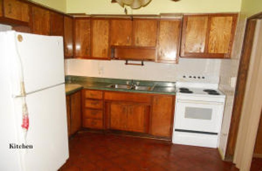 Spacious 4/2 with 1 car carport in desirable Dillman Heights location. Lots of house for $150K.