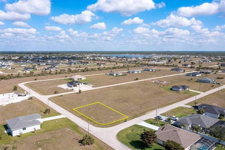 CLEARED Prime Corner Lot, come build your Dream Home!  Discover an incredible opportunity to bring your dream home blueprint to life on this expansive private corner lot.  Boasting in size at over 1/4 acre this cleared and ready to build lot provides endless possibilities for a custom-designed home tailored to your likings.  Imagine an oversized backyard Oasis with a spacious pool, or perhaps a 3-car garage with bonus parking for your boat, RV or motorcycle.  This lot will accommodate it all!  Located in a desirable location you'll enjoy the tranquility of Cape Coral Living just minutes away from stunning waterfronts, shopping, dining and world class Golf Courses!