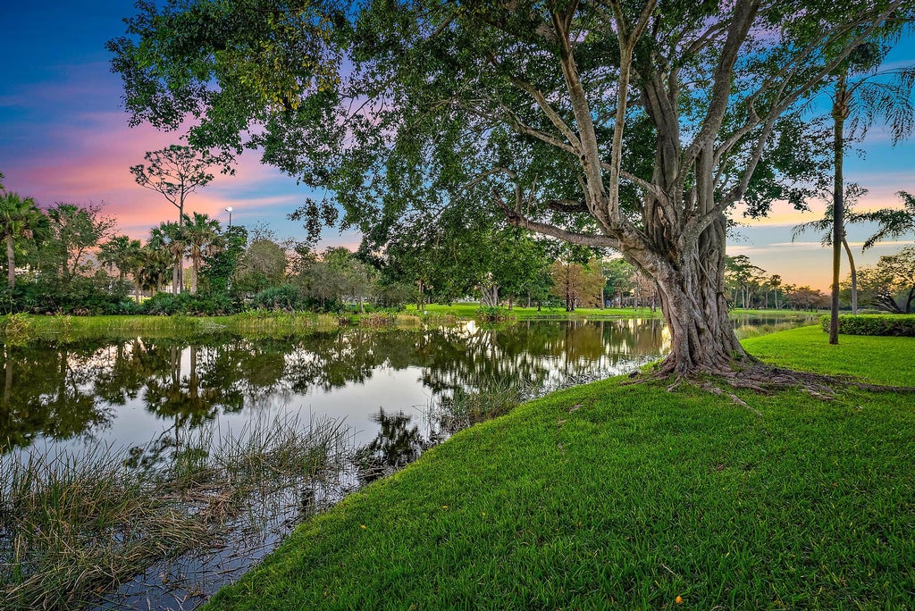 Photo of 8 Lexington Lane E #C, Palm Beach Gardens, FL 33418 (MLS # R11040061)