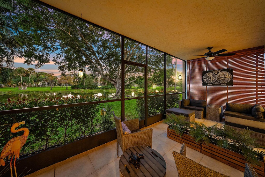 Photo of 8 Lexington Lane E #C, Palm Beach Gardens, FL 33418 (MLS # R11040061)