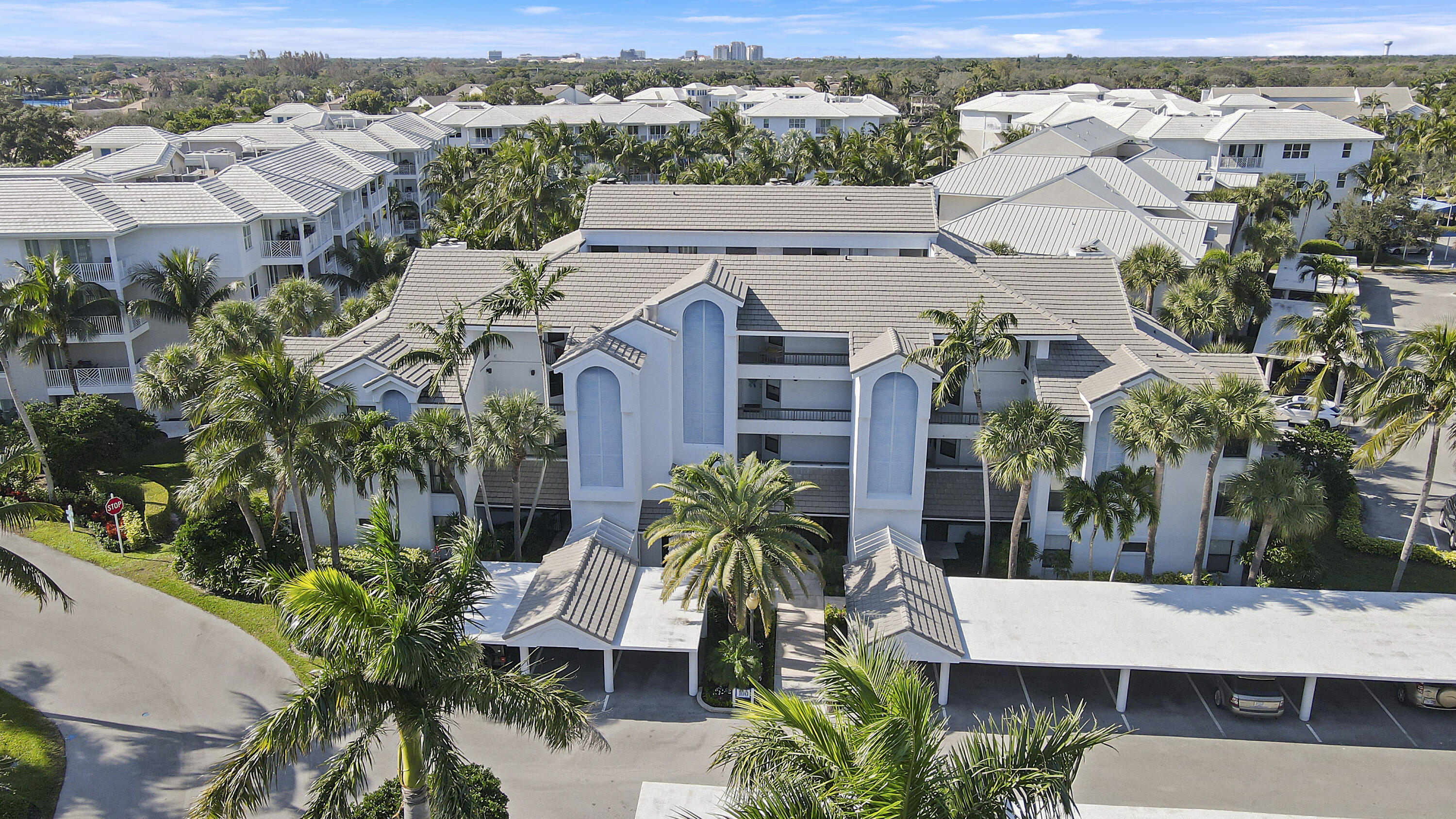 Welcome to Bay Colony. This property is only 1 of 6 two story loft condos. Facing west this unit features a great view of the pool with amazing sunsets from your 4th floor screened balcony. A large living/dining area features a real wood burning fireplace and picturesque views. The loft is unique and can also be used as a 3rd bedroom or office. Vaulted ceilings add to the spacious feeling of the unit. Minutes from all of the dining, shopping and entertainment on PGA Blvd. Juno Beach, Jupiter Beach, the Jupiter Inlet and all of the amenties in northern Palm Beach County are only minutes from your door **Note: Landlord will replace carpeting prior to move in**