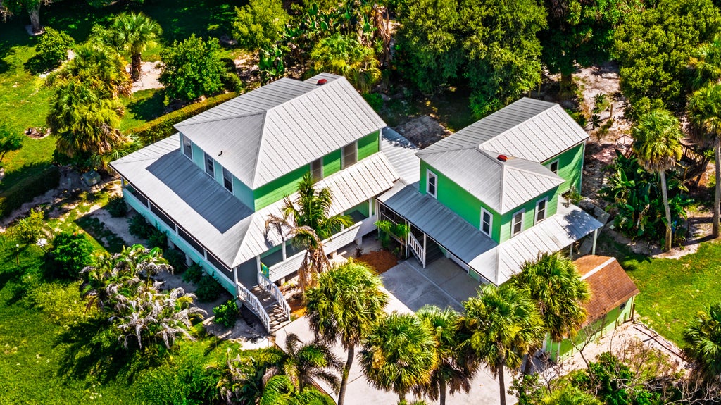 Photo of 13607 S Indian River Drive, Jensen Beach, FL 34957 (MLS # B26050651)