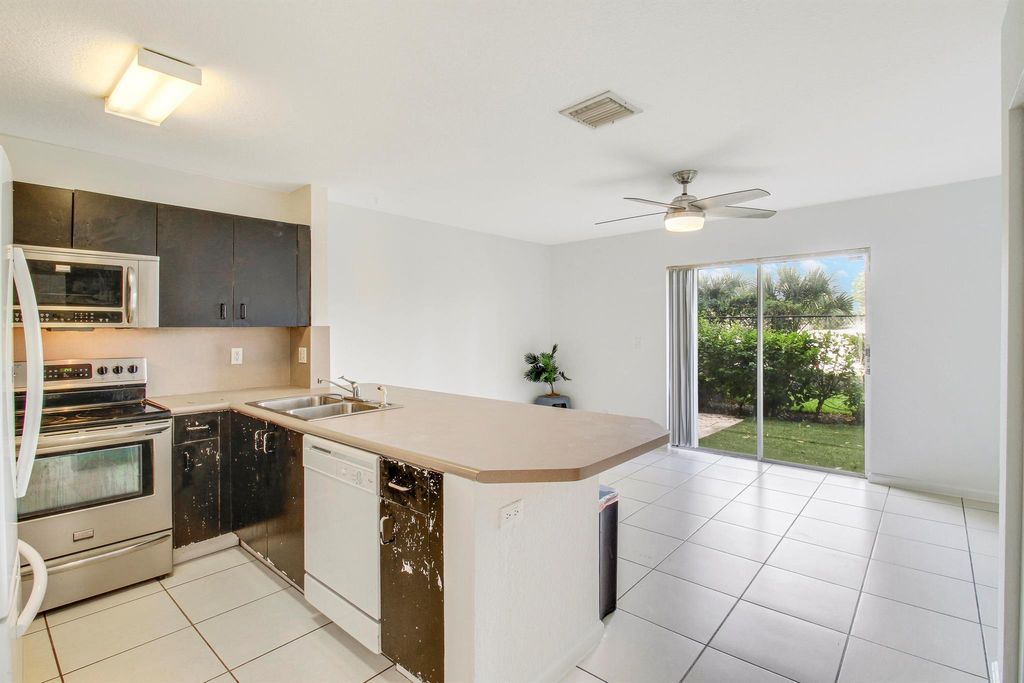 Photo of 986 Summit Lake Drive, West Palm Beach, FL 33406 (MLS # R11012877)