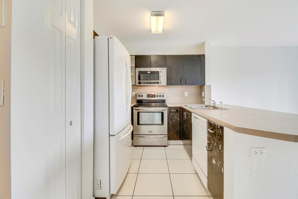 Photo of 986 Summit Lake Drive, West Palm Beach, FL 33406 (MLS # R11012877)