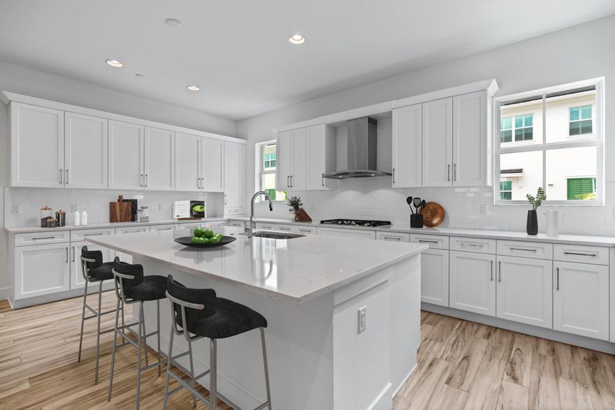 Experience modern townhouse living in the sought-after Alton community of Palm Beach Gardens, just minutes from Jupiter—known as the golf center of Florida. This 2,750 square feet townhome includes a versatile ground-floor den, which can be used as office, or become a 4th bedroom. The open-concept main level features a spacious chef's kitchen with stainless steel GE appliances, a generous center island, and abundant pantry storage, creating the perfect setting for entertaining. The primary suite includes a spa-like bath and walk-in closet. Enjoy covered balconies, impact glass, and a two-car garage. Alton residents enjoy resort-style amenities and proximity to top-rated schools, beautiful Atlantic beaches, world-class golf, and Palm Beach County's vibrant culinary scene. Full Remarks:  Experience modern townhouse living in the highly sought-after Alton community of Palm Beach Gardens, just minutes from Jupiter—an area widely known as the golf center of Florida and one of South Florida's most desirable coastal destinations. Built in 2022, this beautifully designed three-story residence offers approximately 2,750 square feet of living space with 3 bedrooms, 3.5 bathrooms, and a versatile ground-floor den or office, ideal for today's flexible lifestyle.    The main living level features an open-concept design centered around a spacious chef's kitchen with stainless steel GE appliances, a generous center island, and abundant pantry storage, creating the perfect setting for everyday living and entertaining. Elegant porcelain tile flooring that mimics the warmth of natural wood enhances the home's modern design.  Upstairs, the expansive primary suite provides a private retreat with a spa-inspired bathroom featuring dual sinks, a custom shower, and a large walk-in closet. Additional bedrooms offer comfortable accommodations for family or guests.  Outdoor living is elevated with covered balconies and patios on multiple levels, providing private spaces to relax and enjoy the South Florida climate. The home also includes impact glass throughout and a spacious two-car garage with ample storage.  Residents of Alton enjoy access to an exceptional collection of resort-style amenities including a clubhouse, fitness center, pool, pickleball and tennis courts, dog park, playgrounds, and miles of walking and biking paths.  Ideally located just minutes from Alton Town Center, the home is also close to top-rated schools, pristine Atlantic beaches, world-class golf courses throughout the Jupiter area, and an increasingly celebrated culinary scene featuring some of Palm Beach County's finest dining. With easy access to I-95, the Florida Turnpike, and Palm Beach International Airport, this location offers both convenience and an exceptional coastal lifestyle.