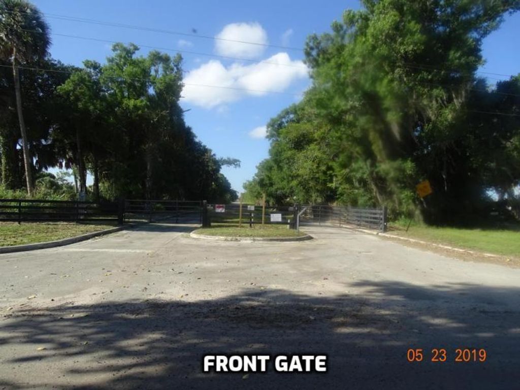 Photo of 22370 SW Hammock River Way, Indiantown, FL 34956 (MLS # F10279001)