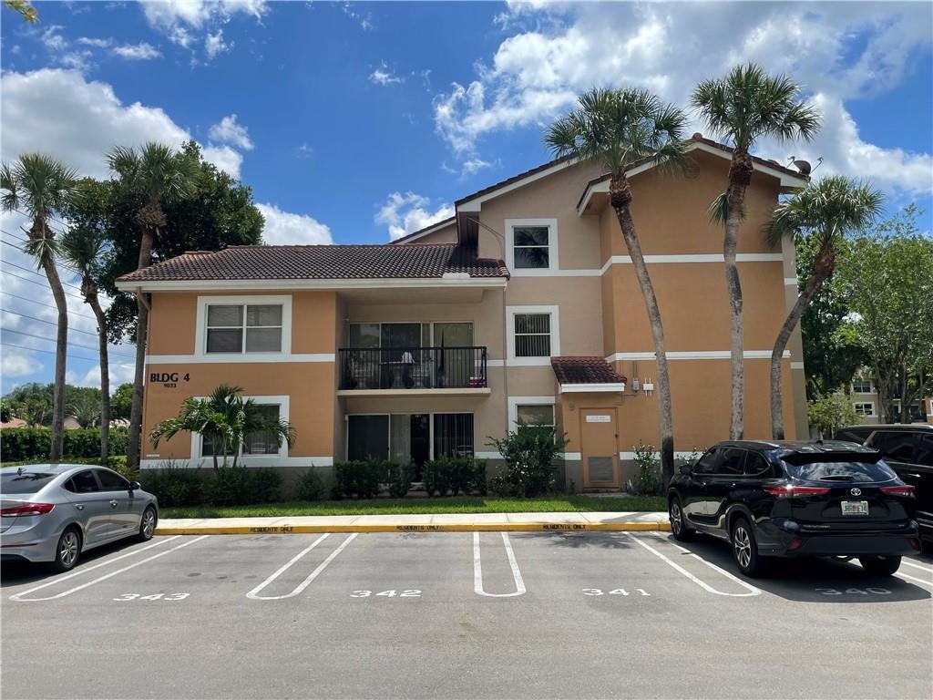 Photo of 9033 WILES Road #302, Coral Springs, FL 33067 (MLS # B26078948)