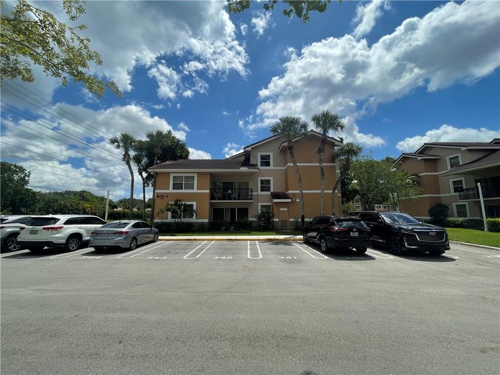 Photo of 9033 WILES Road #302, Coral Springs, FL 33067 (MLS # B26078948)