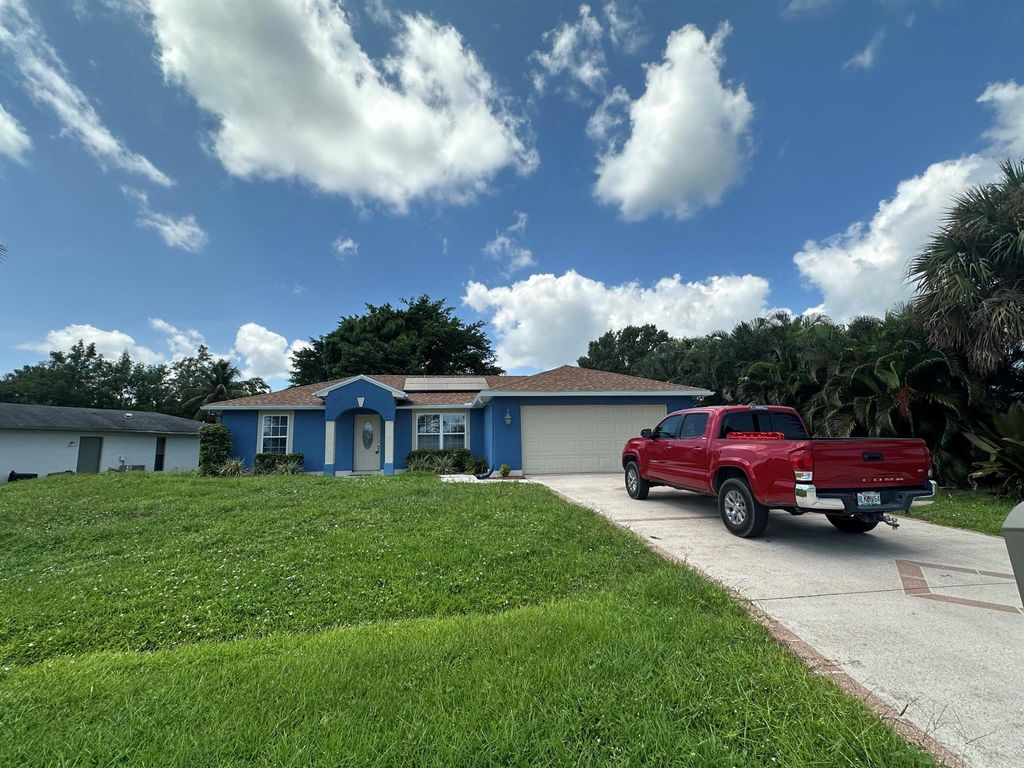 Photo of 2482 SE Camarin Street, Port Saint Lucie, FL 34952 (MLS # R11014782)