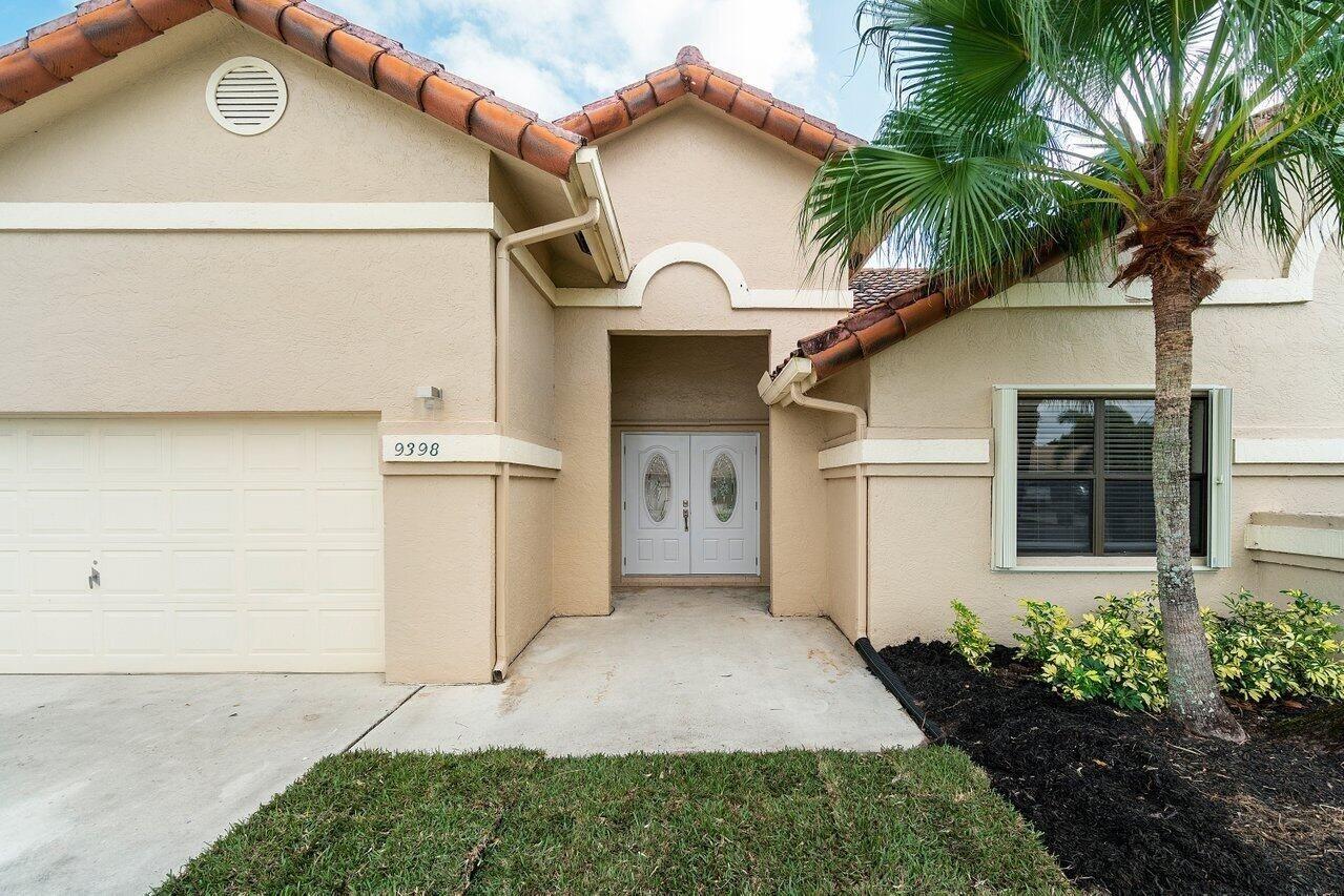Welcome to this stunning and meticulously maintained 4-bedroom home on a large corner lot. The desirable split floor plan includes a master suite and three guest rooms. The home features two bathrooms (one with a tub/shower combo, the other a stand-up shower) and a full-size 2-car garage. Enjoy a comfortable living environment with a newly installed 2024 AC and a new water heater. The interior has been recently painted, with new tile flooring throughout. All appliances well maintained, along with a new washer and dryer. Community amenities include a heated pool, tennis, and pickleball courts. The neighborhood is patrolled by Sheriff's Office, and is located near A+ rated schools. lawn care, cable, & internet included. Close to both I-95 and the Florida Turnpike.