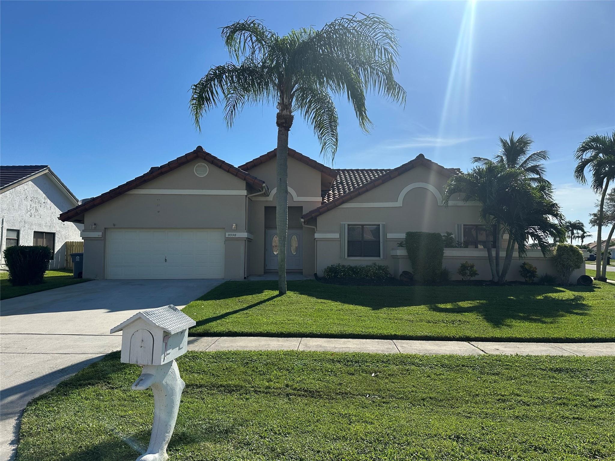 Welcome to this stunning and meticulously maintained 4-bedroom home on a large corner lot. The desirable split floor plan includes a master suite and three guest rooms. The home features two bathrooms (one with a tub/shower combo, the other a stand-up shower) and a full-size 2-car garage. Enjoy a comfortable living environment with a newly installed 2024 AC and a new water heater. The interior has been recently painted, with new tile flooring throughout. All appliances well maintained, along with a new washer and dryer. Community amenities include a heated pool, tennis, and pickleball courts. The neighborhood is patrolled by Sheriff's Office, and is located near A+ rated schools. lawn care, cable, & internet included. Close to both I-95 and the Florida Turnpike.