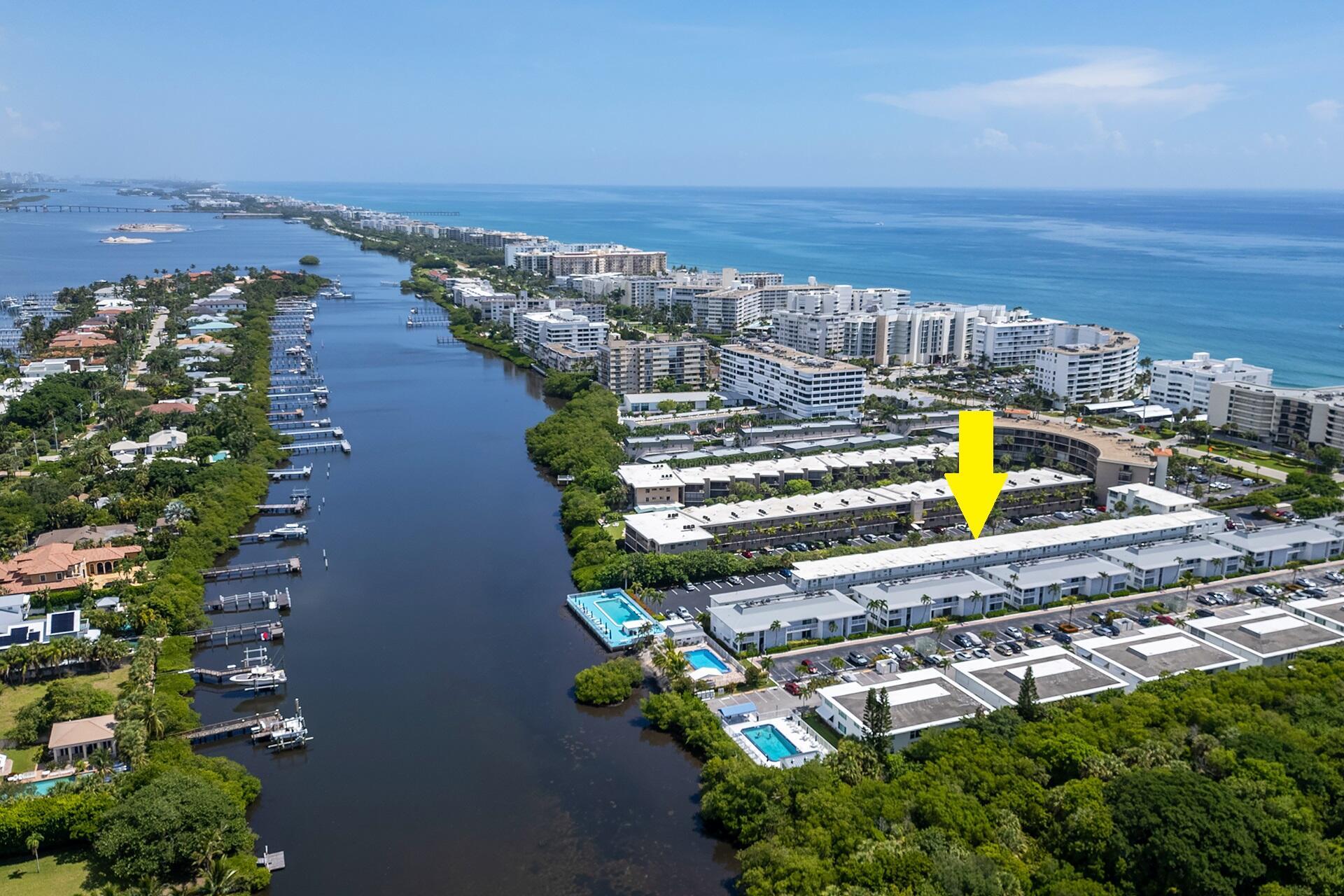 Waterfront 55+ Living Between the Ocean & Intracoastal Waterway! Wake up to sea breezes at Tropicana in this charming 1BR/1BA co-op/condo, ideally located in South Palm Beach. Enjoy coffee on your covered porch, then stroll or bike the scenic S. Ocean Blvd trail to the public beach, Dune Deck, Eau Palm Beach Resort & Spa (featuring Nobu), Publix, Ice Cream Club, Art Basil, Thaikyo, John G's, Lantana Nature Preserve, & more. The swimming pool overlooks the Intracoastal Waterway--perfect for a sunset swim. Additional features include assigned parking, storage, & on-site laundry facilities. Minutes to Old Key Lime House, Lake Worth Beach, public golf courses, & more. A rare chance for affordable coastal living close to everything you love. Cash only. No rentals or pets.