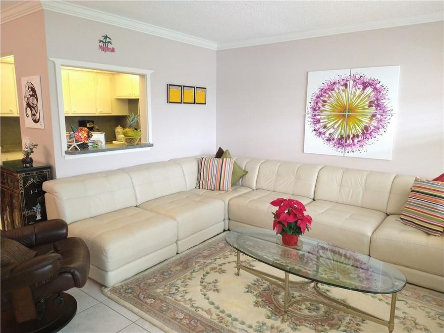 TURN KEY 2ND FLOOR UNIT. MRS CLEAN LIVES HERE! FULLY STOCKED AND FURNISHED! TILED THROUGHOUT. GORGEOUS LEATHER SECTIONAL IN LIVINGRM, NEWER SS APPLIANCES, CROWN MOLDING, PAINT IS NEUTRAL TONE. READY FOR MOVE IN! GENTLY USED AC & WATERHEATER (OFF FOR 9 MONTHS; ON FOR 3.) SHORT WALK ACROSS THE GRASS TO MARKHAM POOL. BUILDING IS WELL MAINTAINED & SITUATED IN EXSPANSIVE GREEN AREA SET BACK. 5 STAR CLUBHOUSE FEATURES STATE OF THE ART GYM, CLUBS AND GLASSES GALORE, PICKLEBALL, TENNIS, SHUFFLEBOARD, BILLIARDS, BOCCE, 18 POOLS & SO MUCH MORE IN A GATED COMMUNITY 3.5 MILES FROM GORGEOUS DEERFIELD BEACH! SHUTTLE BUSES RUN EVERY 30 MINS! CLOSE TO FABULOUS SHOPPING AND AWESOME EATERIES! JUST BRING YOUR TOOTHBRUSH AND COME ON DOWN FOR FUN IN THE SUN! *CLOSING TO TAKE PLACE 3/2022*