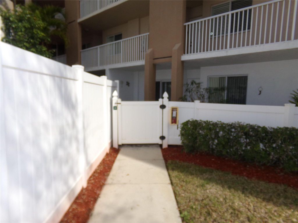 Photo of 9563 Weldon Circle #D110, Tamarac, FL 33321 (MLS # F10554002)